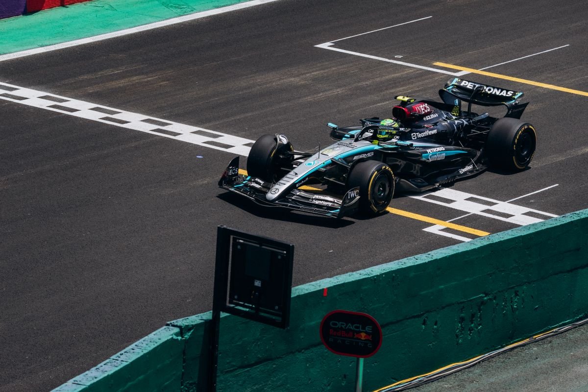 Modern Formula 1 car crossing the start-finish line