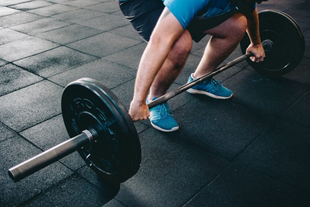 Close-up of a deadlift setup with a loaded barbell