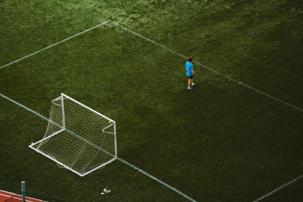 Aerial view of a goal on an artificial turf pitch