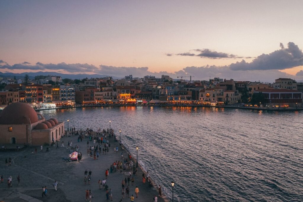 Venetian harbour at Chania lit at dusk